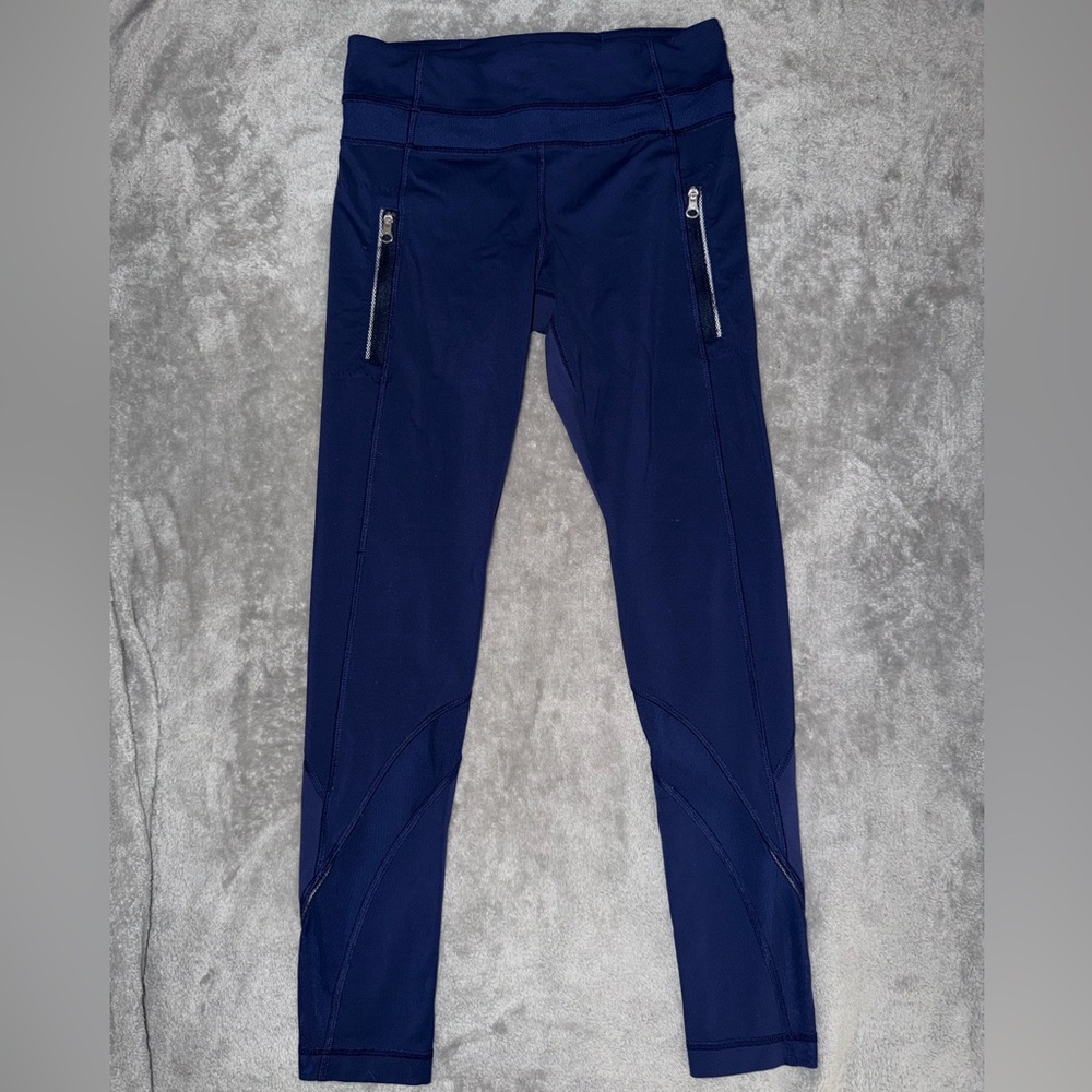 Lululemon Inspire II Size 4 Hero Navy Blue zipper pocket 7/8” active leggings.